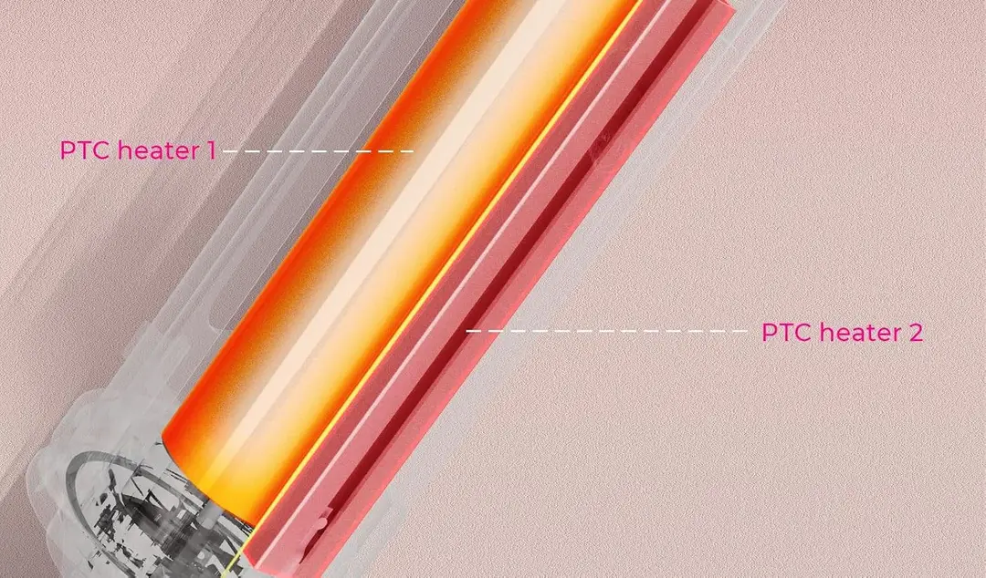 cutaway of the rotating curling iron barrel showing two PTC heaters