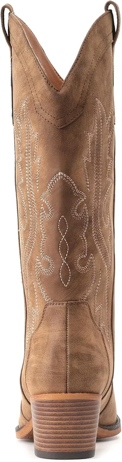 profile of the embroidered cowboy boot showing the stacked heel