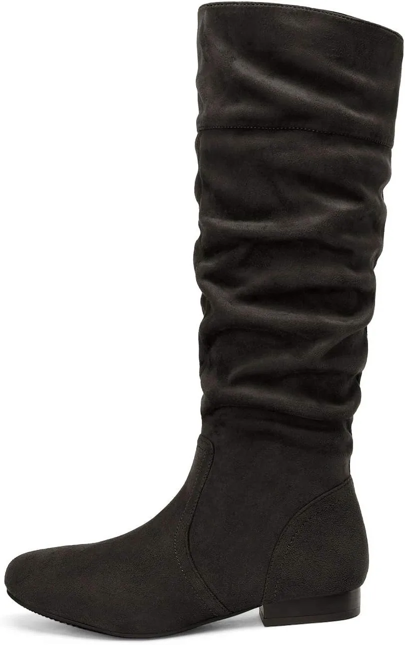 ruched shaft of the black slouchy knee high boot