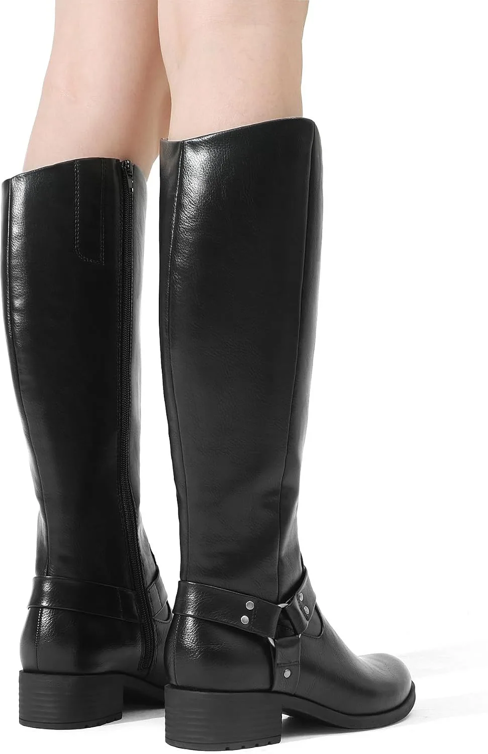 back view of the black knee high boots on legs
