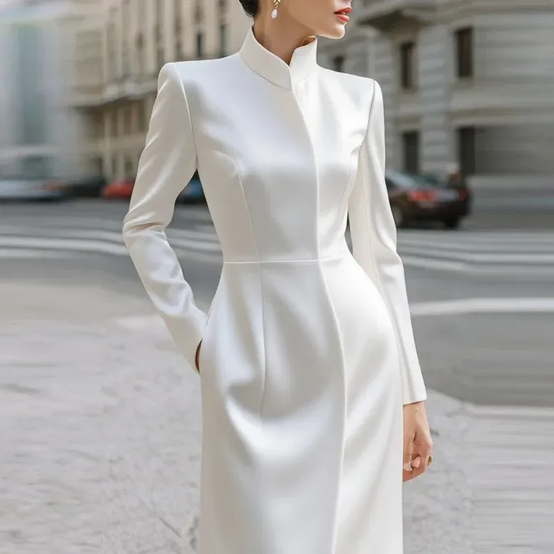 straight silhouette of the white stand collar midi dress with long sleeves
