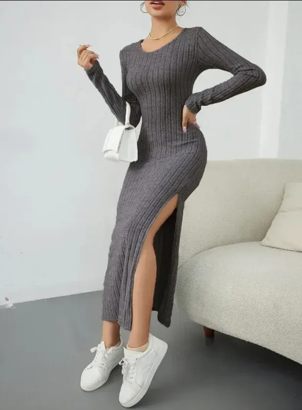 dark grey ribbed knit midi dress showing the high side slit