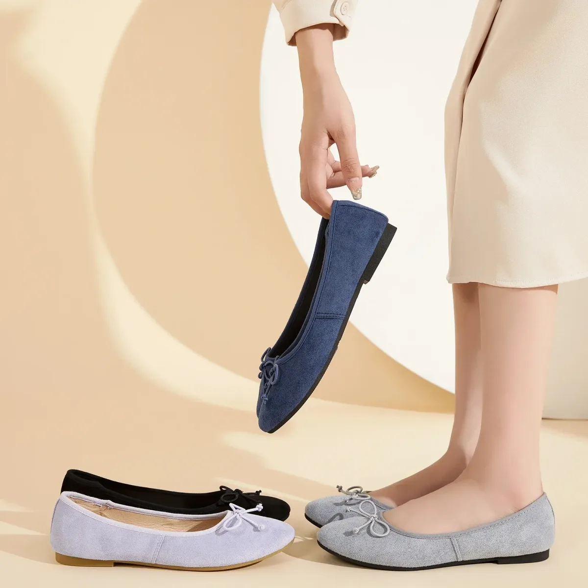 woman wearing soft microsuede ballet flats with cropped trousers