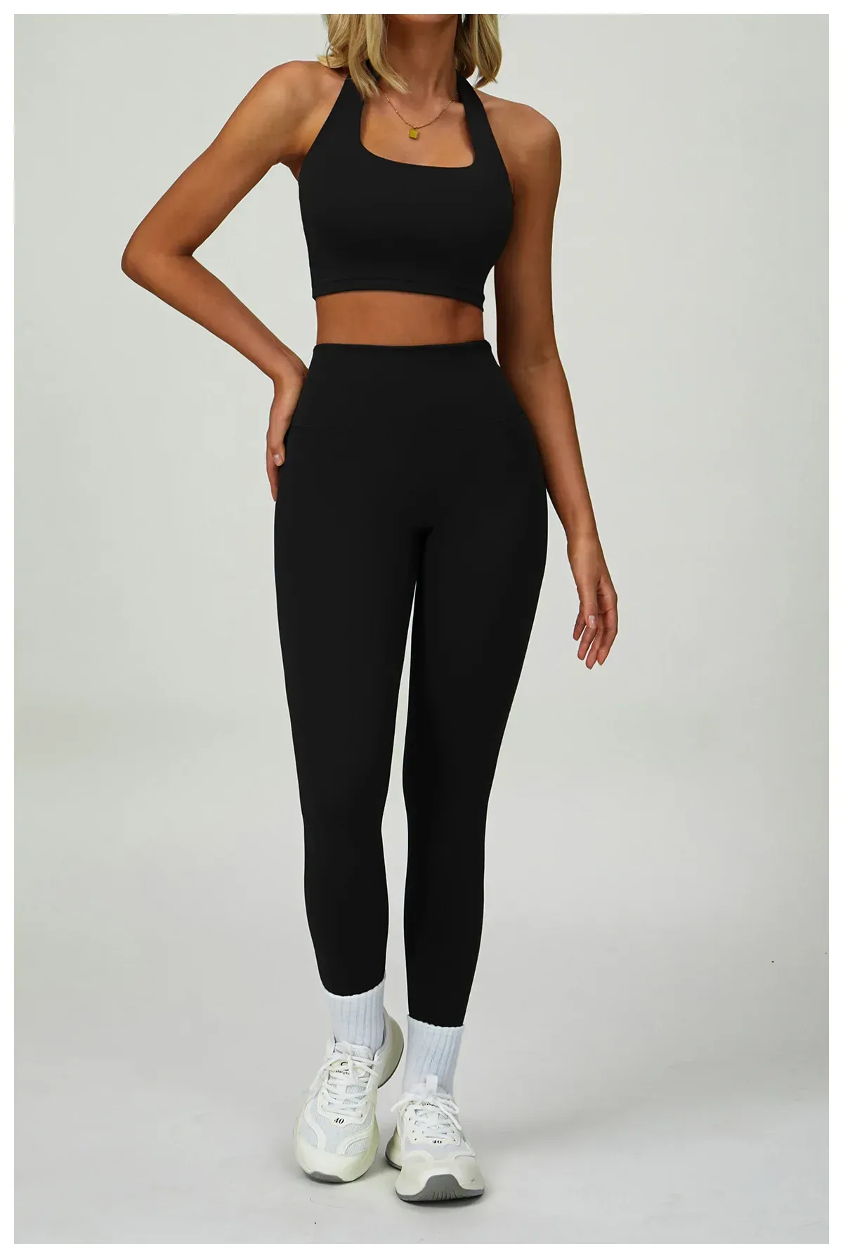 black halter sports bra and full length leggings activewear set