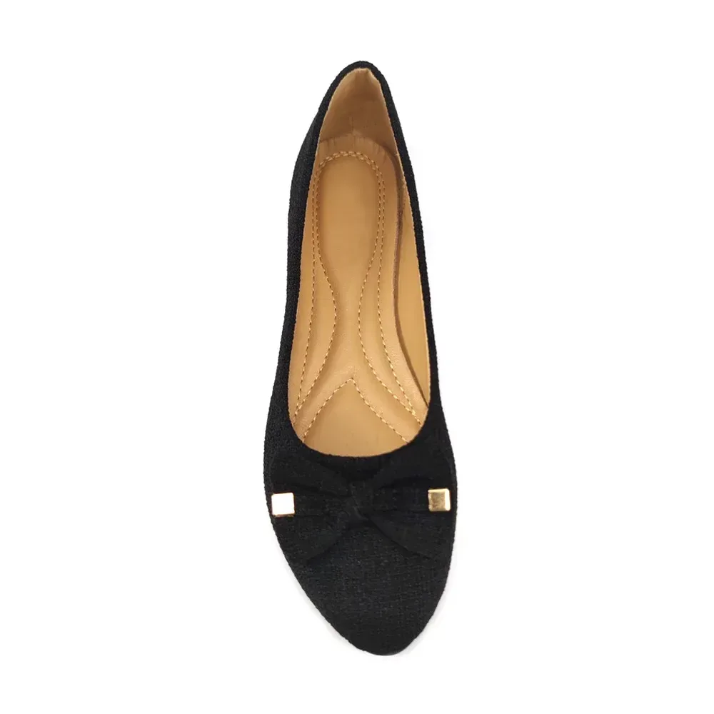 cushioned footbed with stitched arch shaping inside a woven ballet flat