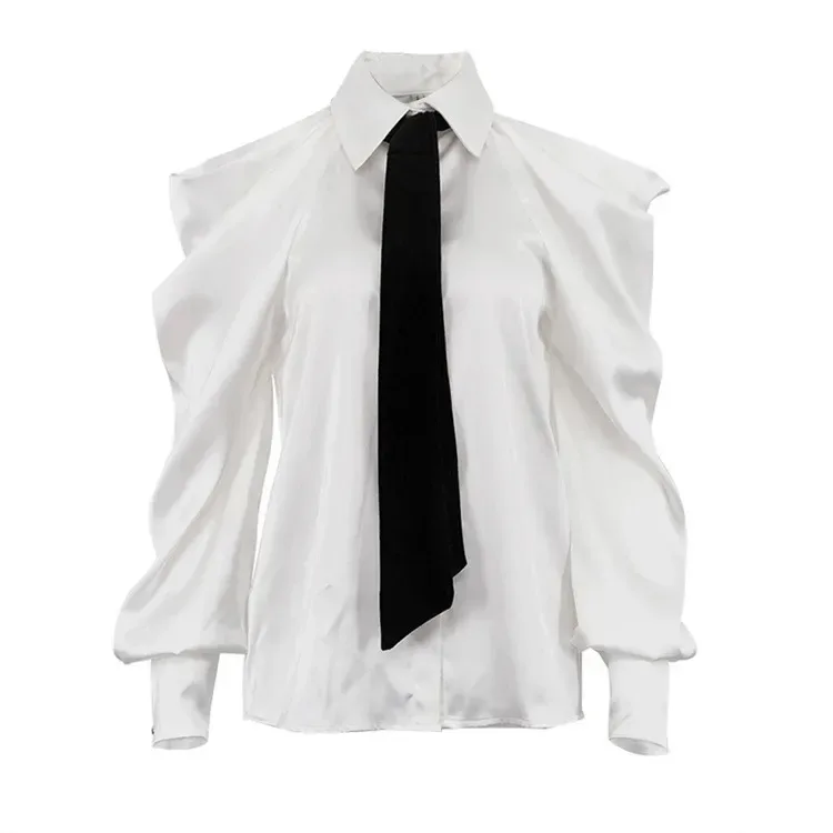 white satin shirt with the long black tie worn under the collar