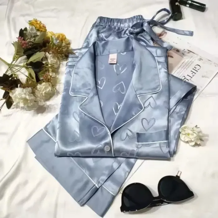tone on tone heart jacquard and piped notch collar on a satin pajama set