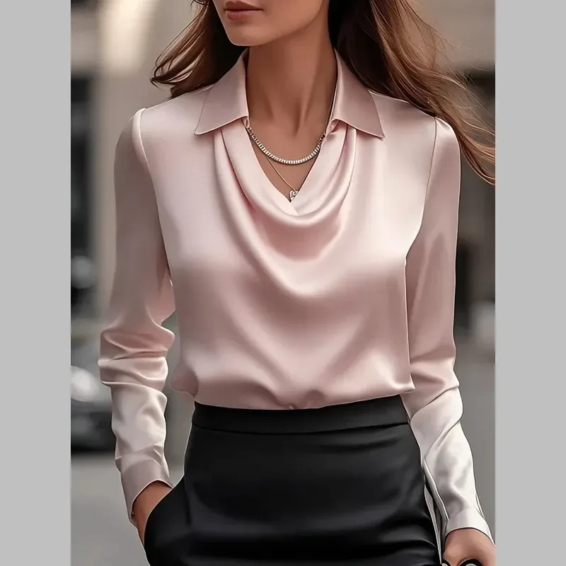 relaxed fit of the pink satin cowl neck blouse