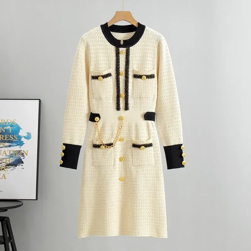 front of the beige knit midi dress showing four trimmed pockets