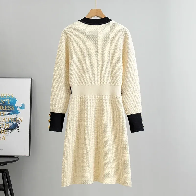 back view of the beige textured knit midi dress with contrast cuffs