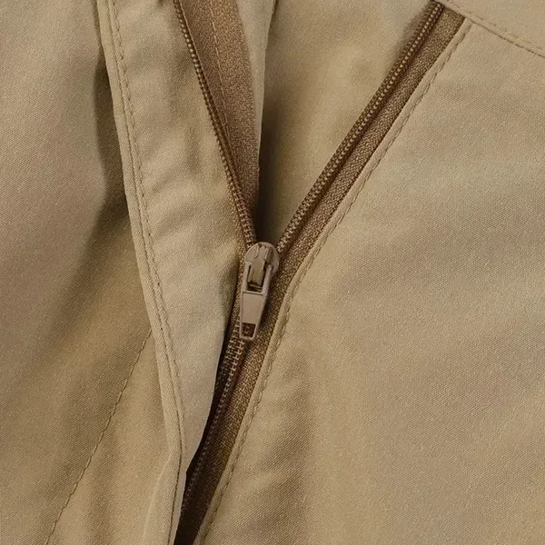 zip fly detail of the high waisted wide leg pants