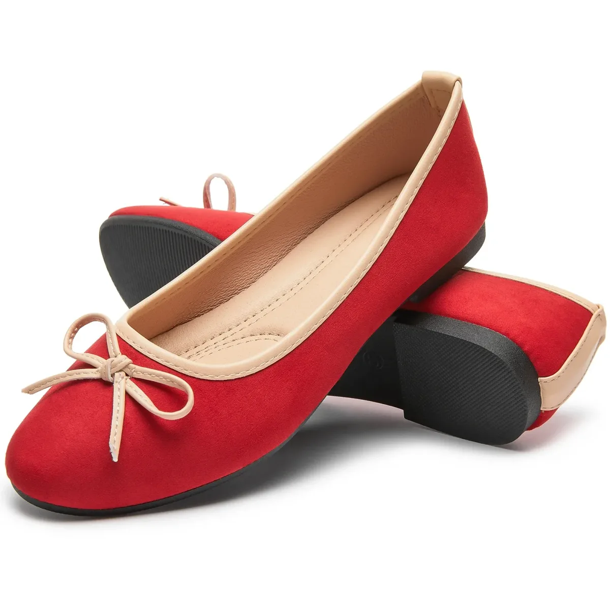 pair of red bow ballet flats with round toe