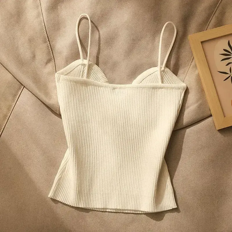 back view of the white rib knit cami top with thin straps
