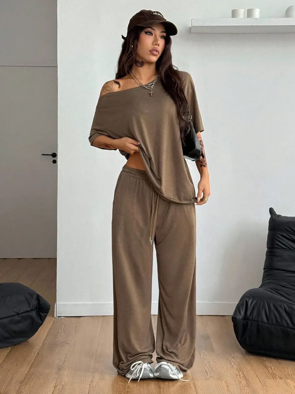 wide off shoulder neckline of the lounge set tee
