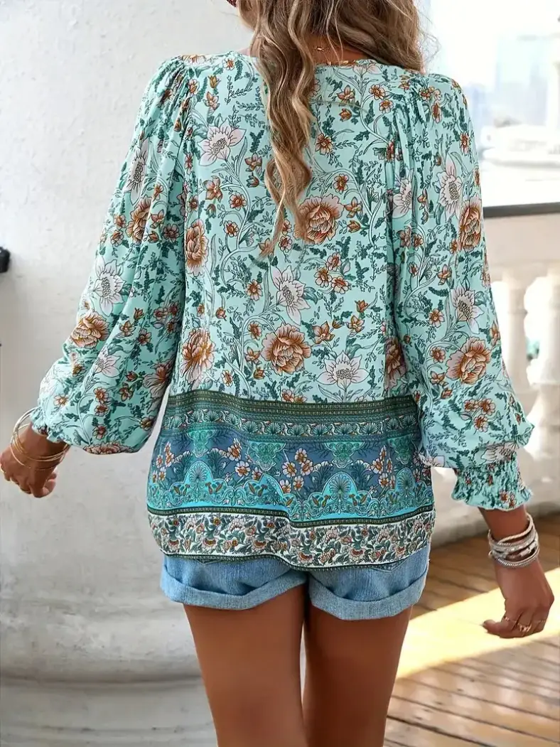 back of the boho floral print blouse showing the border print hem