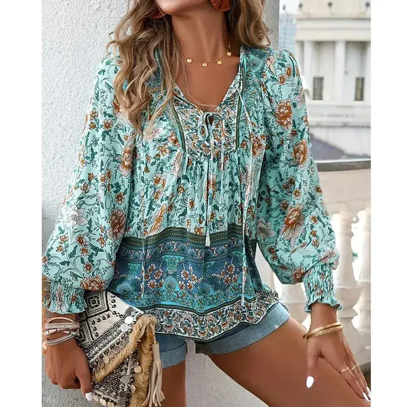 smocked cuffs and tie neckline on the boho floral print blouse