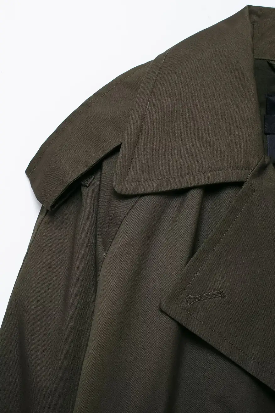 notched collar detail of the cropped trench jacket
