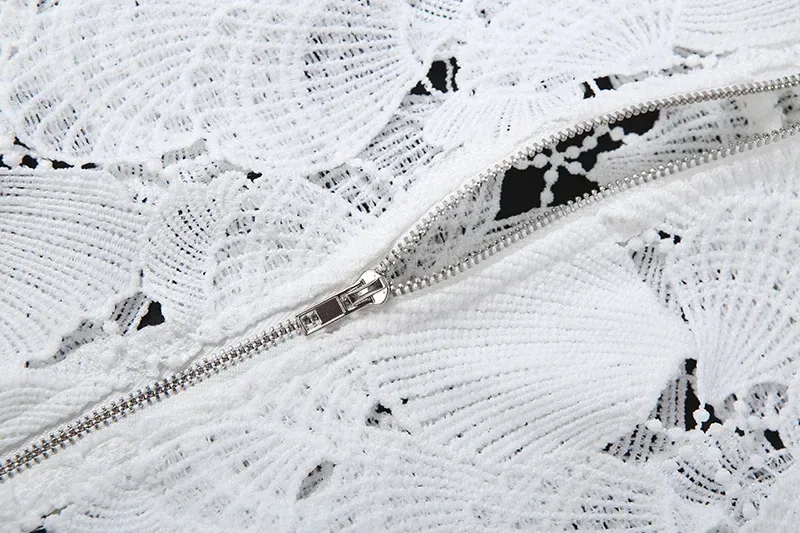 close view of the back zip on the lace crop top