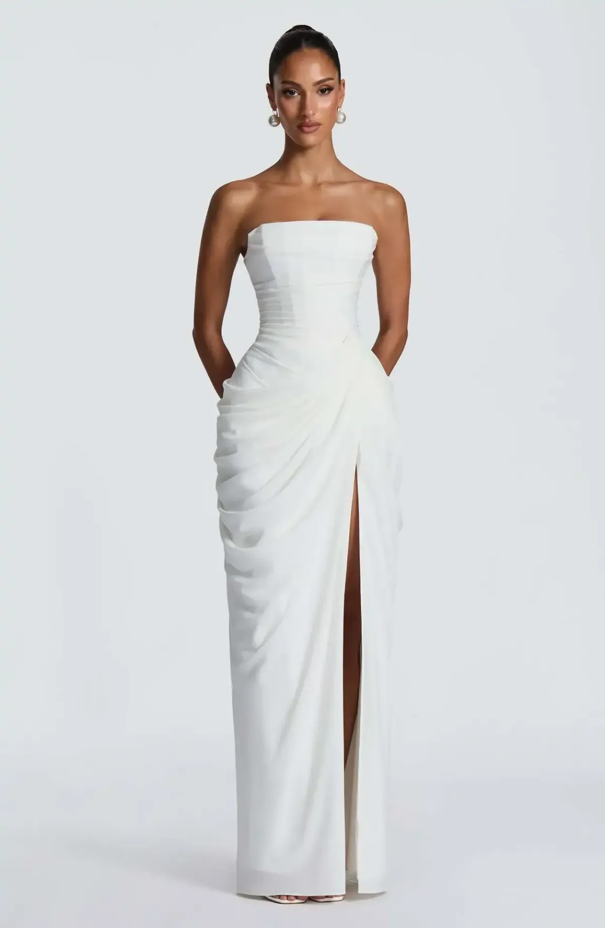 structured strapless bodice of the ivory corset maxi dress