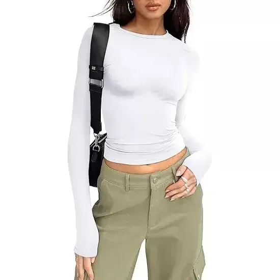 slim fit of the white long sleeve crew neck crop top
