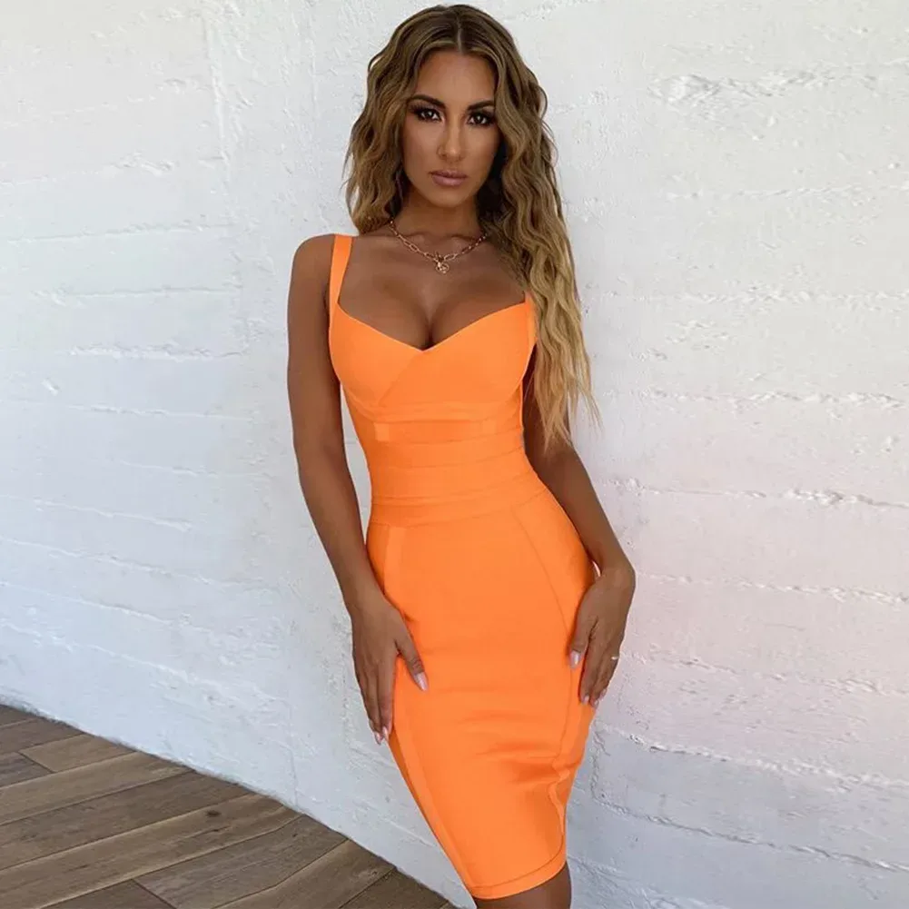 stretch bandage panels shaping the waist of the orange dress
